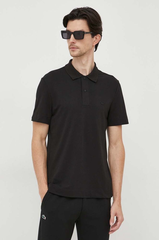 Поло Lacoste чоловічий колір чорний однотонний (3538309)